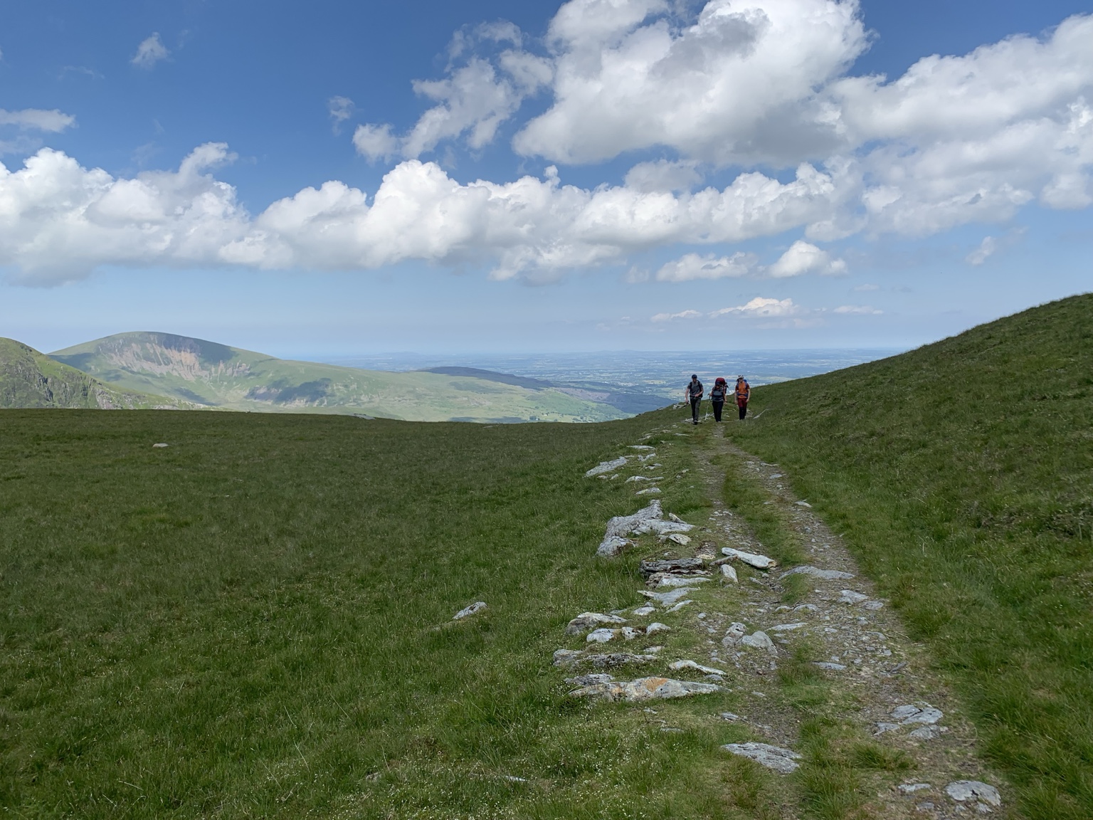 A team walking through open countryside
